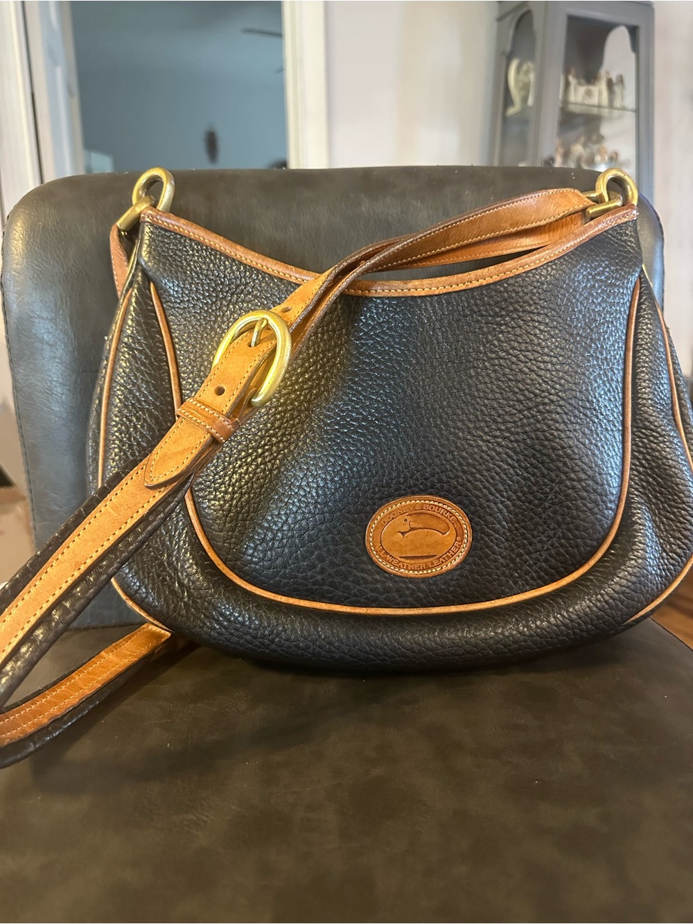 Dooney & Bourke Black Pebbled Leather Shoulder Bag with Brown Trim